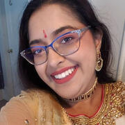 A selfie of Leona in gold and pink Indian attire.